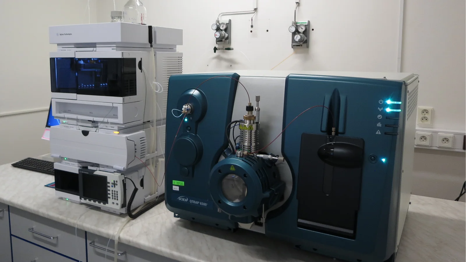Liquid chromatograph coupled to a tandem mass spectrometer on a laboratory bench